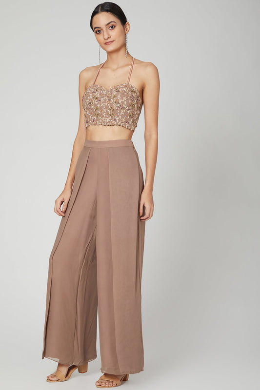 Almond Flared Pants With A Halter Blouse