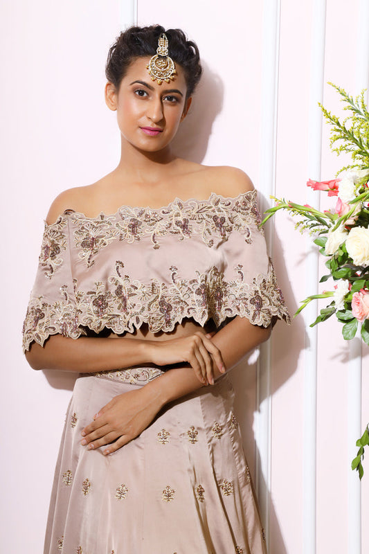 Almond Embroidered Off Shoulder Cape With Bustier And Lehenga Skirt